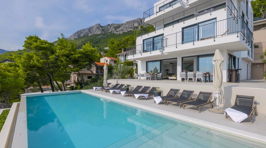 Luxurious villa Bacana's exterior with the heated infinity pool